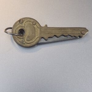 vintage key-shaped pocket knife, sometimes called a "key knife" or folding knife